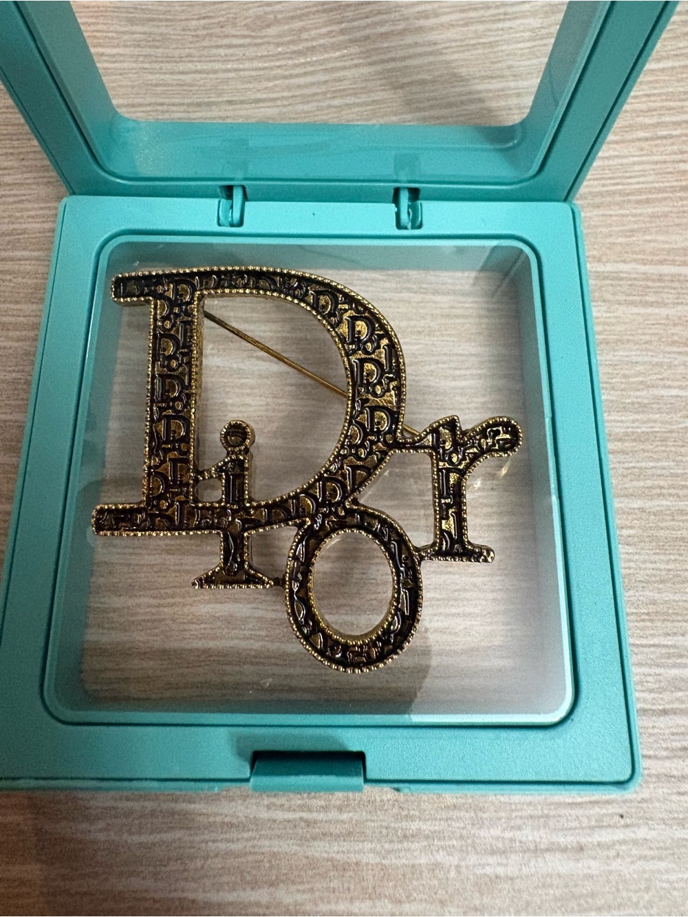 Preloved antique gold tone Dior brooch excellent condition